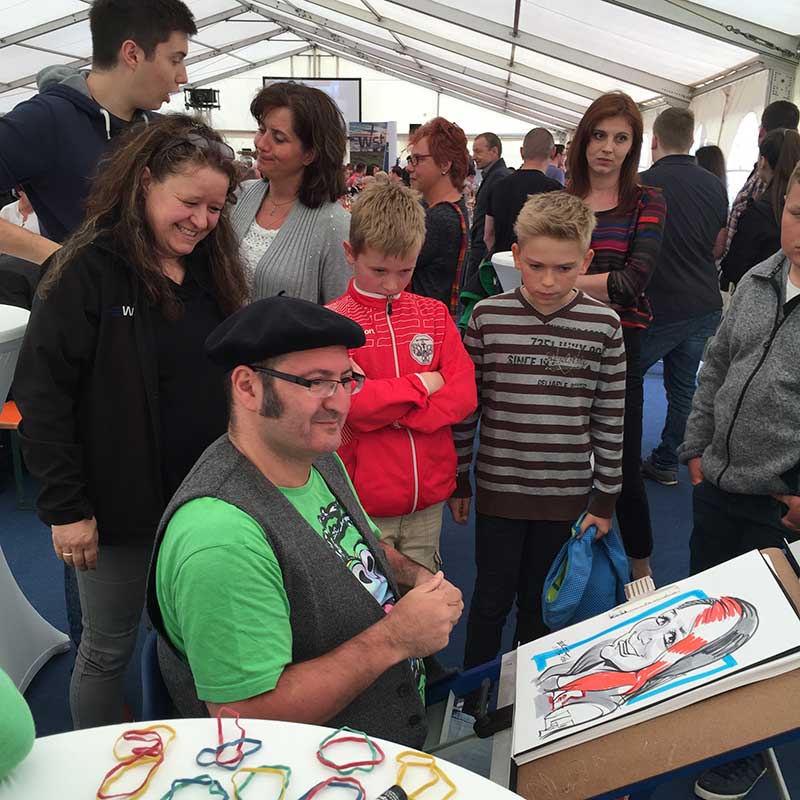 karikaturist schnellzeichner firmenevent weihnachtsfeier jubilaeum 40