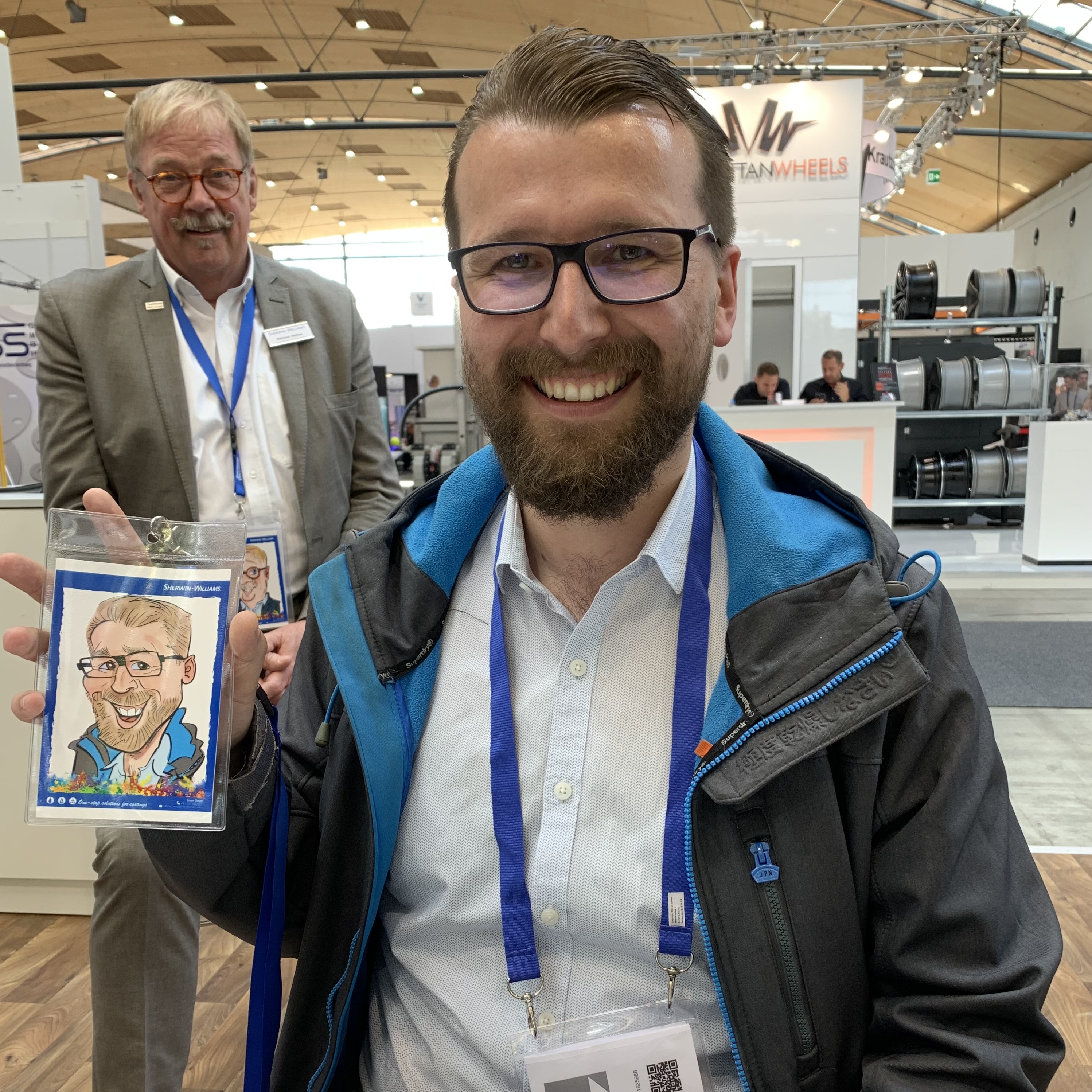 iPad Karikatur an Messestand